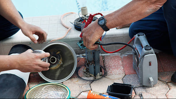 Service Techs performing pool equipment repair
